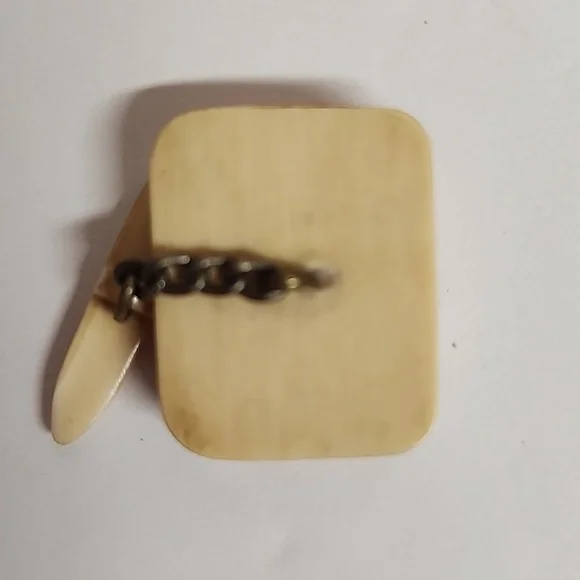 Vintage cream intricate bearded man holding staff cufflinks.Rare find. Unique.